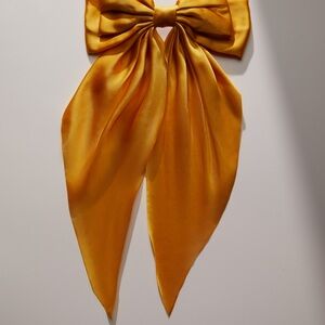 Elegant Gold Satin Bow
